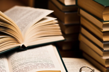 opened book, lying on the bookshelf